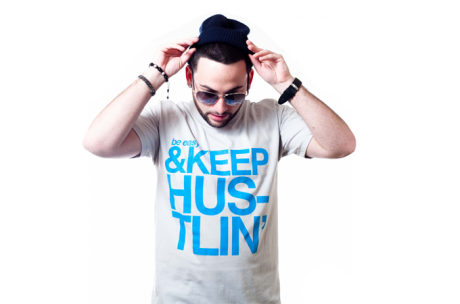 DJ Rob Ru wearing our gray keep hustlin tee