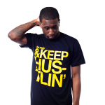 Benjy wearing our black and yellow keep hustlin tee