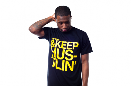 Benjy wearing our black and yellow keep hustlin tee