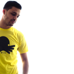 Mike Gomes wearing our octopus tri-blend tee in yellow