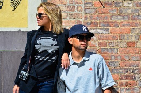 models wearing our black vinyl tee and gray polo